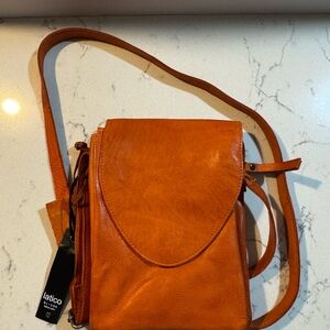 Latico Orange Pebble grain Leather Crossbody Bag